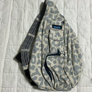 Brand new, no tags, Kavu rope sling backpack. Blue pattern.